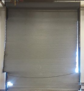 Monsoon Commercial Garage Door Damage - Martin Garage Door of Nevada